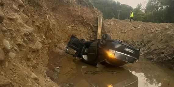 DEREYE UÇAN OTOMOBİLDE BABA VE OĞLU HAYATINI KAYBETTİ